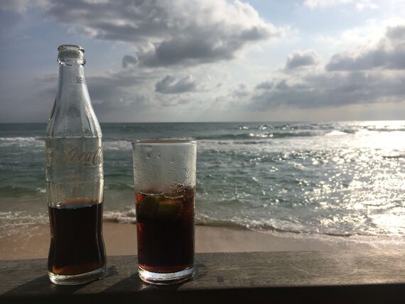 Coke and ocean at Wijaya beach
